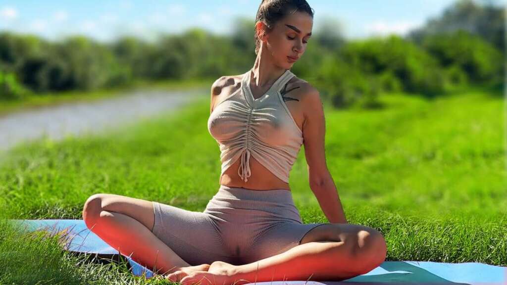 Morning Yoga And Stretching Legs In Nature